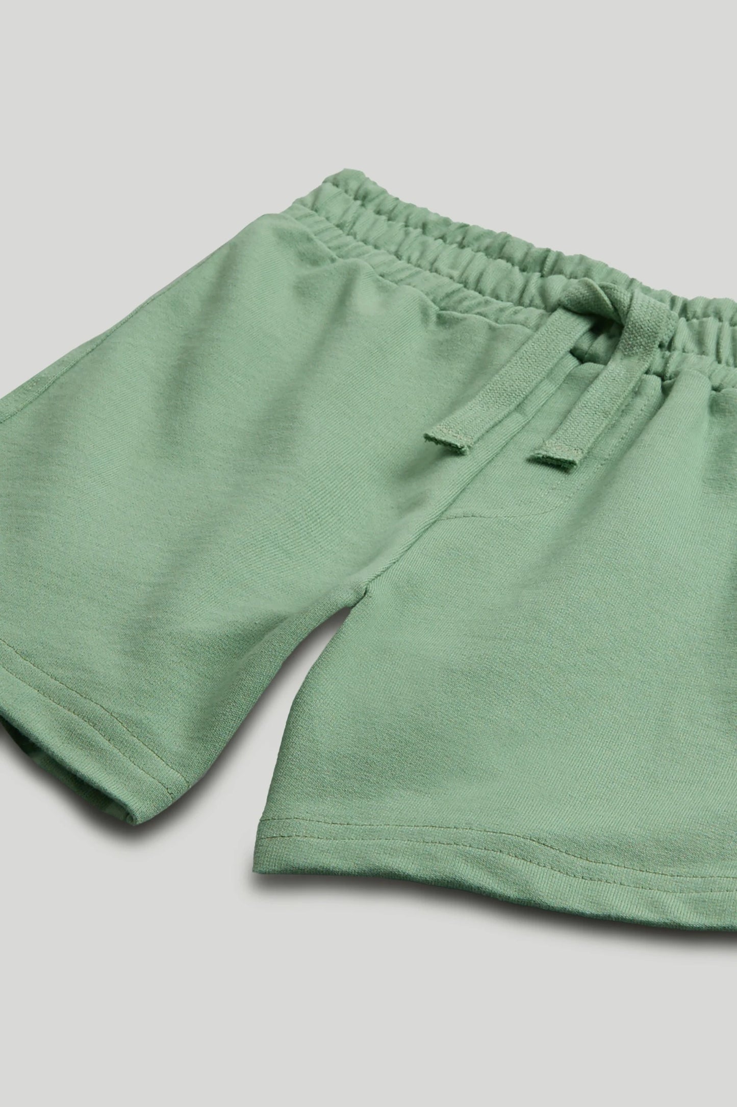 Green Crocodile Shorts and T-Shirt Outfit