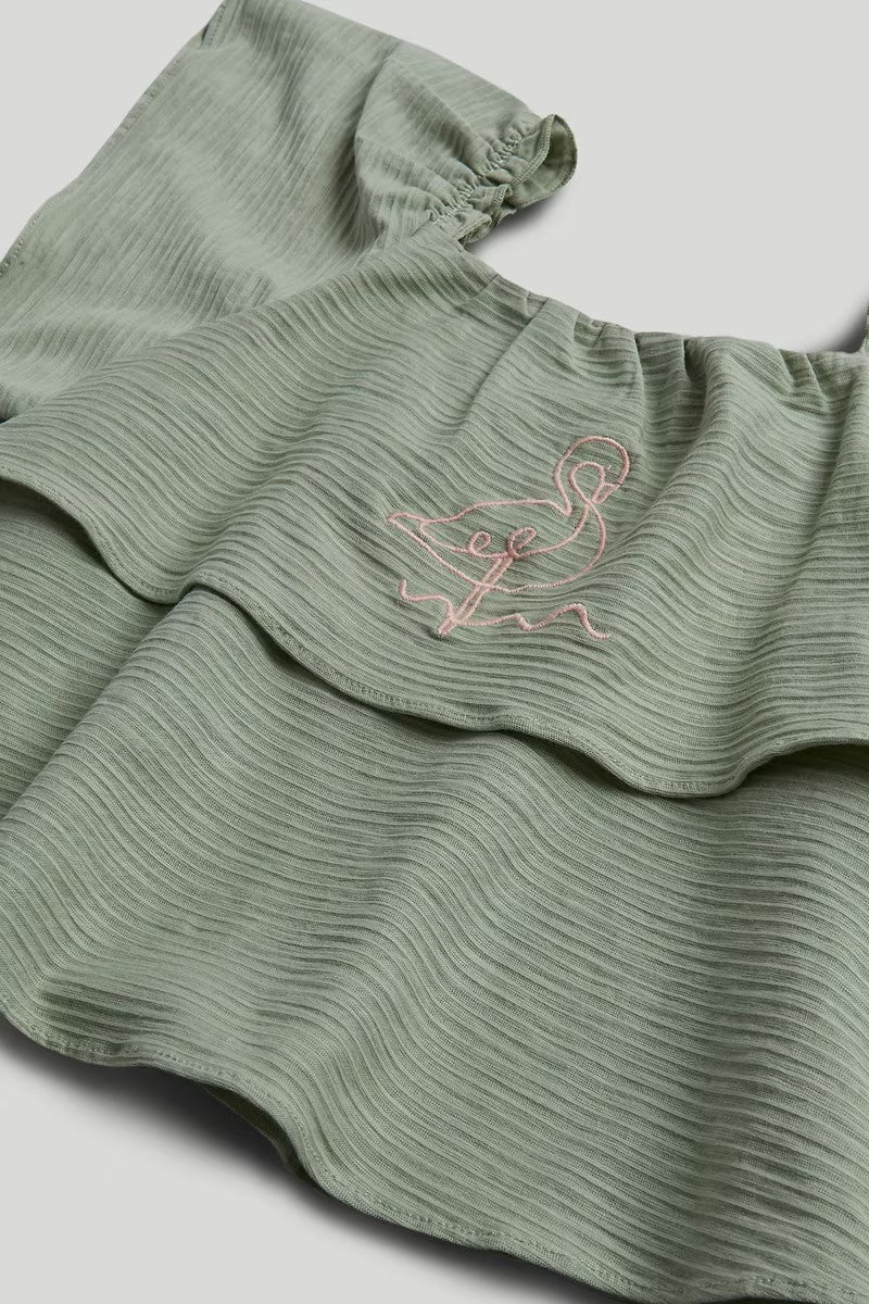 Green Top and Trousers Outfit